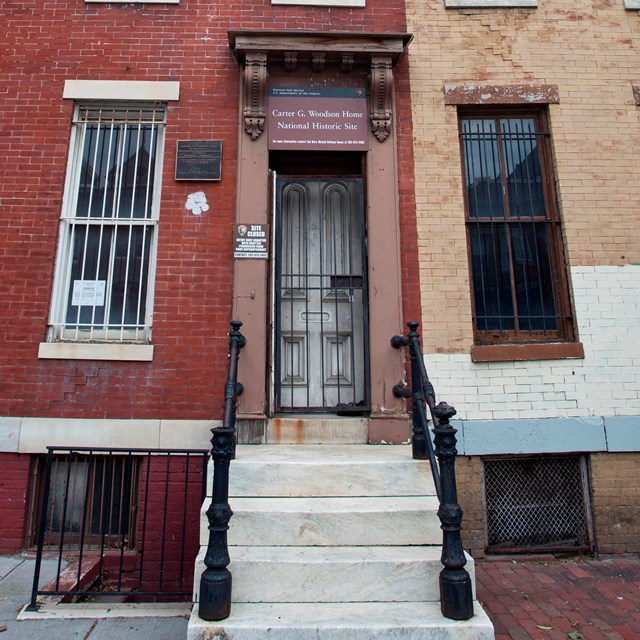 Outside the front door of the Carter G. Woodson Home.